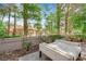Relaxing backyard patio area with a daybed and privacy in a tranquil setting at 8170 Round Hills Cir, Las Vegas, NV 89113