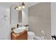 Stylish powder room featuring a vessel sink, modern fixtures, and elegant gold-framed mirror at 8170 Round Hills Cir, Las Vegas, NV 89113
