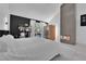 Bright bedroom featuring a fireplace, private sauna, and lots of natural light at 8170 Round Hills Cir, Las Vegas, NV 89113
