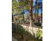 Backyard shows manicured landscaping and outdoor seating area with a pool at 8170 Round Hills Cir, Las Vegas, NV 89113