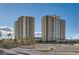 Exterior view of two high-rise buildings with multiple balconies at 8255 Las Vegas Blvd # 1504, Las Vegas, NV 89123