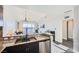 Granite countertops, stainless steel appliances, and views into the living space at 8255 Las Vegas Blvd # 1504, Las Vegas, NV 89123