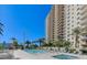 Beautiful pool area with a view of the high rise building, featuring spa and lounge area at 8255 Las Vegas Blvd # 1504, Las Vegas, NV 89123