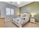 Cozy bedroom features a decorative color scheme, a window with shutters, and nice furnishings at 9475 Windham Heights Ct, Las Vegas, NV 89139
