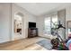 Bedroom space with hard wood flooring and access to a private outdoor patio at 9475 Windham Heights Ct, Las Vegas, NV 89139