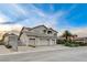 Lovely home exterior featuring mature landscaping and a separate garage, adding charm and functionality at 9475 Windham Heights Ct, Las Vegas, NV 89139