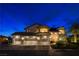Stunning two-story home featuring a three-car garage, meticulous landscaping, and a grand entrance at 9475 Windham Heights Ct, Las Vegas, NV 89139