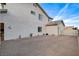Exterior showing the side of the home and a large driveway of a well kept stucco home at 9475 Windham Heights Ct, Las Vegas, NV 89139