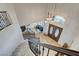 Grand foyer with a high ceiling, chandelier lighting, and double doors leading to a spacious living area at 9475 Windham Heights Ct, Las Vegas, NV 89139