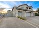 Spacious three-car garage with an extended driveway, offering plenty of parking and storage space at 9475 Windham Heights Ct, Las Vegas, NV 89139