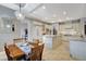 Spacious open kitchen offers granite countertops, an island, stainless appliances, and a breakfast nook at 9475 Windham Heights Ct, Las Vegas, NV 89139