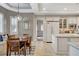Bright kitchen features a breakfast nook with a window seat, granite countertops, and stainless appliances at 9475 Windham Heights Ct, Las Vegas, NV 89139