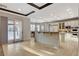 Gourmet kitchen with stone counters, white cabinets, and stainless steel appliances at 9475 Windham Heights Ct, Las Vegas, NV 89139