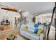 Spacious living room with staircase, hardwood floors, and an open layout to dining at 9475 Windham Heights Ct, Las Vegas, NV 89139
