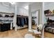 Organized walk-in closet featuring shelves, rods, and drawers for storing clothing and accessories at 9475 Windham Heights Ct, Las Vegas, NV 89139