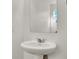Clean powder room featuring white vessel sink and bright light at 4735 Agave Cactus St, North Las Vegas, NV 89031