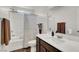 Bathroom including a shower, toilet, and vanity with a sink at 4735 Agave Cactus St, North Las Vegas, NV 89031