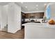 Modern kitchen featuring quartz countertops, stainless steel appliances, and ample cabinet space at 4735 Agave Cactus St, North Las Vegas, NV 89031