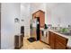 Kitchen featuring stainless steel appliances, including a refrigerator and a sink with granite countertops at 10086 Aspen Rose St # 101, Las Vegas, NV 89183