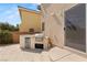 Backyard featuring an outdoor grill and refrigerator for outdoor cooking at 10892 Royal Highlands St, Las Vegas, NV 89141