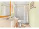 Bathroom featuring a shower and bath combination with a white shower curtain at 10892 Royal Highlands St, Las Vegas, NV 89141