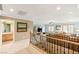 Loft with staircase and railing shows access to the bathroom and the bonus space at 10892 Royal Highlands St, Las Vegas, NV 89141