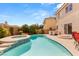 Backyard pool and spa with lush landscaping in a well-maintained backyard at 10892 Royal Highlands St, Las Vegas, NV 89141