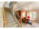 Staircase leads to a versatile loft space featuring a built-in Murphy bed and ample natural light at 10892 Royal Highlands St, Las Vegas, NV 89141
