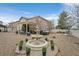 Large backyard featuring a fountain, hot tub, pergola, and gazebo perfect for relaxation and entertainment at 1465 Via Savona Dr, Henderson, NV 89052