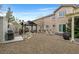 Expansive backyard featuring a gazebo with seating, built in grill, and patio area great for gatherings and outdoor enjoyment at 1465 Via Savona Dr, Henderson, NV 89052