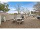 Inviting backyard features a picnic table, built in grill, hot tub, and hardscape perfect for Gathering gatherings and outdoor dining at 1465 Via Savona Dr, Henderson, NV 89052