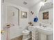Well-maintained half-bath with decorative niche, modern fixtures, and classic decor at 1465 Via Savona Dr, Henderson, NV 89052