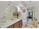 Bathroom features a stylish sink vanity, mirrored shower and a view to a second adjoining bathroom at 1465 Via Savona Dr, Henderson, NV 89052