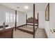 Cozy bedroom featuring natural light, and a wooden bedframe at 1465 Via Savona Dr, Henderson, NV 89052