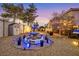 Charming backyard featuring a stone fountain as the focal point, complemented by a gazebo at 1465 Via Savona Dr, Henderson, NV 89052