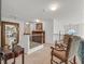 Loft area featuring an open floor plan with a stylish chandelier and view to downstairs at 1465 Via Savona Dr, Henderson, NV 89052