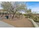 Scenic walking path surrounded by mature trees and landscaping at 1465 Via Savona Dr, Henderson, NV 89052