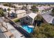Overhead view of the property with a pool, set among manicured landscaping and neighborhood streets at 1501 Scenic Peak St, Las Vegas, NV 89144