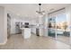 Modern kitchen boasts stainless appliances, island, and backyard access at 1501 Scenic Peak St, Las Vegas, NV 89144