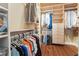 Walk-in closet with custom built-in shelving and organization at 1661 Warrenville St, Las Vegas, NV 89117