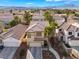 Lovely two-story home with desert landscaping, tile roof, and mountain views at 1661 Warrenville St, Las Vegas, NV 89117