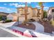 Charming two-story home with a well-manicured lawn and a spacious driveway at 1661 Warrenville St, Las Vegas, NV 89117