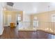 Upstairs loft area with wooden floors and white railing at 1661 Warrenville St, Las Vegas, NV 89117