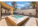Inviting backyard pool and spa area with covered patio, perfect for outdoor entertaining at 1661 Warrenville St, Las Vegas, NV 89117