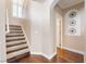 A carpeted stairway with white banister and shuttered window invites you upstairs at 1661 Warrenville St, Las Vegas, NV 89117