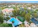 Resort-style community pool with lush landscaping, clubhouse, and ample parking at 2221 Glenbrook Way, Las Vegas, NV 89117
