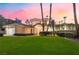 Charming residence featuring a well-kept lawn, mature landscaping, and a welcoming entrance at 2221 Glenbrook Way, Las Vegas, NV 89117