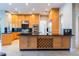 Modern kitchen featuring stainless steel appliances, custom cabinets, and ample counter space at 2221 Glenbrook Way, Las Vegas, NV 89117