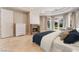 Inviting main bedroom featuring a fireplace, tile floors, and a comfortable sitting area, designed for relaxation at 2221 Glenbrook Way, Las Vegas, NV 89117