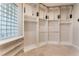 Spacious walk-in closet with built-in shelving and ample storage, providing an organized and stylish space at 2221 Glenbrook Way, Las Vegas, NV 89117